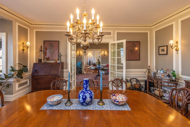 18 Bayside Dr, Belfast, ME 04915 - dining space with a decorative wall, a chandelier, and french doors
