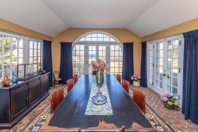 18 Bayside Dr, Belfast, ME 04915 - dining room with french doors, lofted ceiling, and brick floors