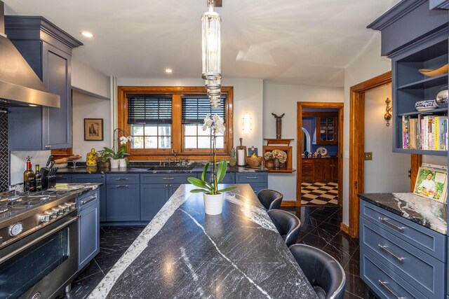 18 Bayside Dr, Belfast, ME 04915 - kitchen featuring wall chimney exhaust hood, stove, pendant lighting, recessed lighting, and blue cabinetry