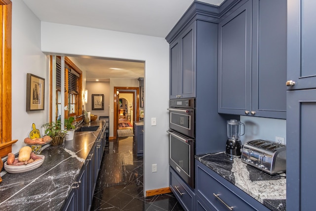 18 Bayside Dr, Belfast, ME 04915 - kitchen featuring stainless steel double oven and dark stone countertops