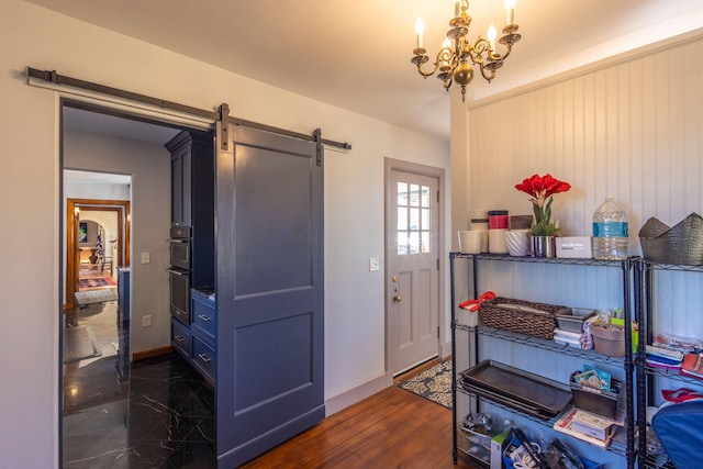 18 Bayside Dr, Belfast, ME 04915 - foyer featuring a barn door and a chandelier