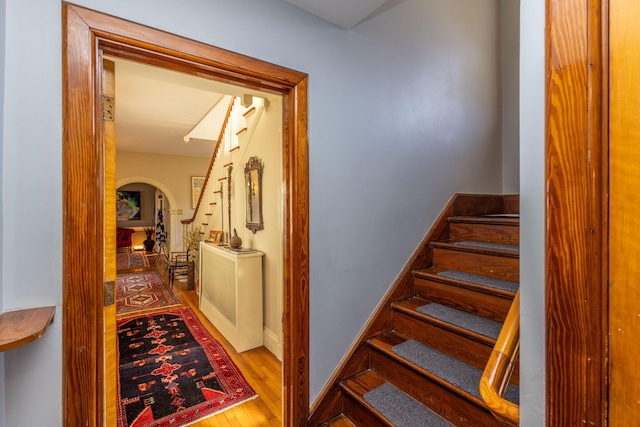 18 Bayside Dr, Belfast, ME 04915 - stairs featuring arched walkways and wood finished floors