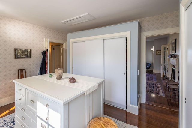 18 Bayside Dr, Belfast, ME 04915 - bedroom featuring dark wood-style floors, wallpapered walls, and a closet