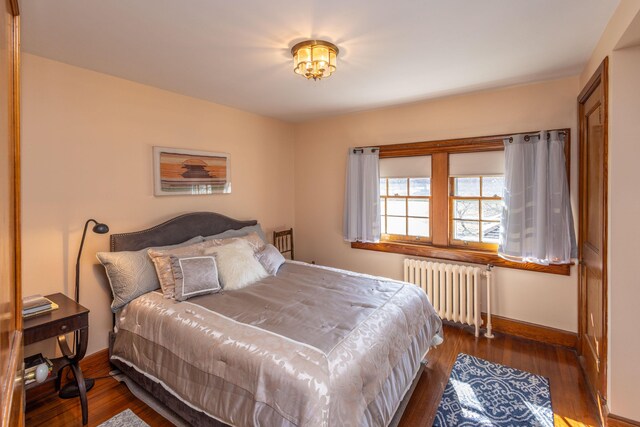 18 Bayside Dr, Belfast, ME 04915 - bedroom featuring radiator and wood finished floors