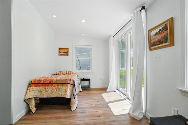 51 Four Wheel Dr, Brunswick, ME 04011 - bedroom with multiple windows, access to outside, light wood finished floors, and recessed lighting