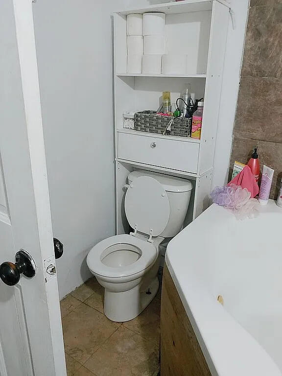 690 Middle Rd, Union, ME 04862 - bathroom with toilet and tile patterned floors