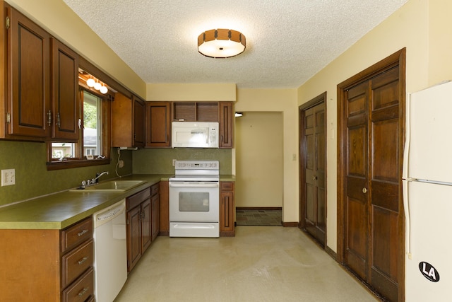 56 Borland Hill Rd, Nobleboro, ME 04555 - kitchen featuring white appliances, a textured ceiling, and decorative backsplash