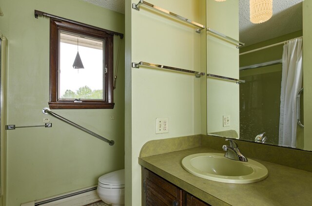 56 Borland Hill Rd, Nobleboro, ME 04555 - bathroom featuring baseboard heating, vanity, curtained shower, and a textured ceiling