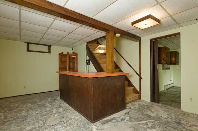 56 Borland Hill Rd, Nobleboro, ME 04555 - indoor dry bar featuring a paneled ceiling, stairway, and a baseboard heating unit