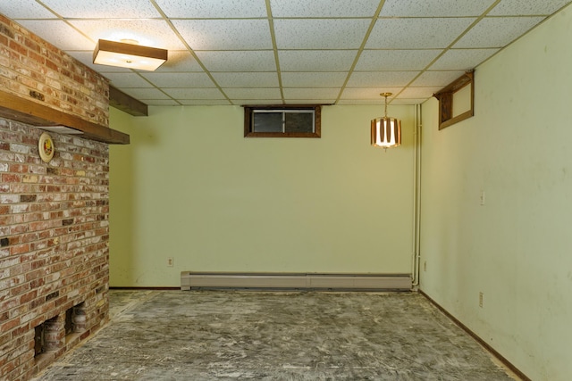 56 Borland Hill Rd, Nobleboro, ME 04555 - finished below grade area featuring a drop ceiling and a baseboard radiator