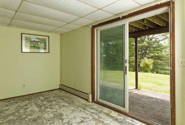 56 Borland Hill Rd, Nobleboro, ME 04555 - doorway with a baseboard heating unit and a paneled ceiling