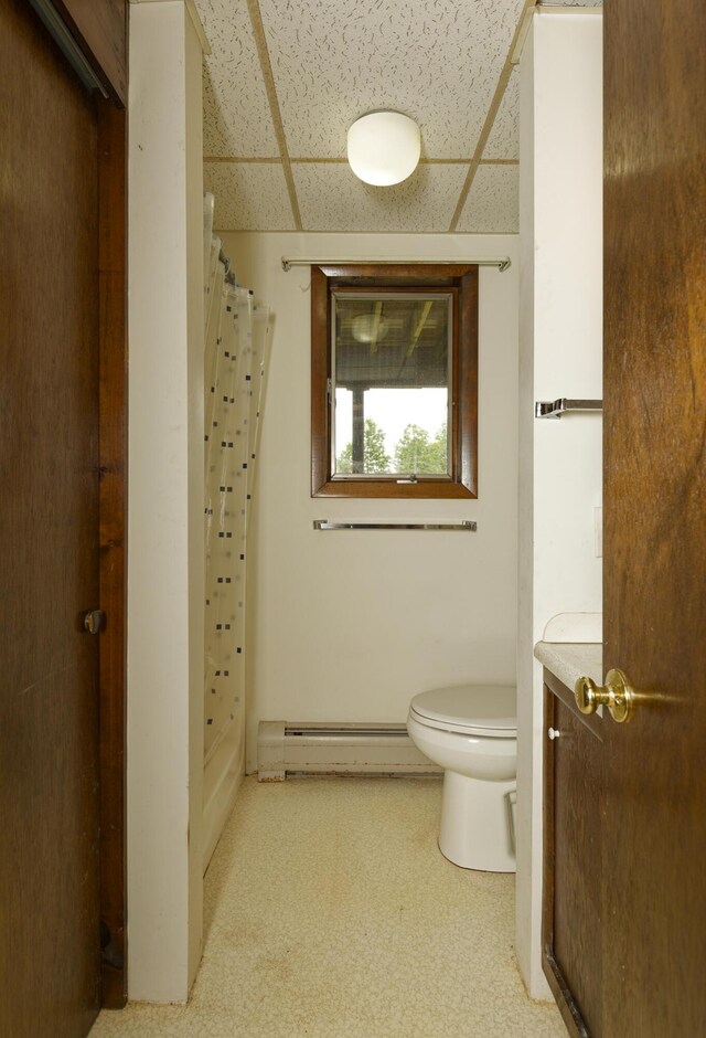 56 Borland Hill Rd, Nobleboro, ME 04555 - full bath featuring a baseboard radiator, a drop ceiling, and a shower with shower curtain