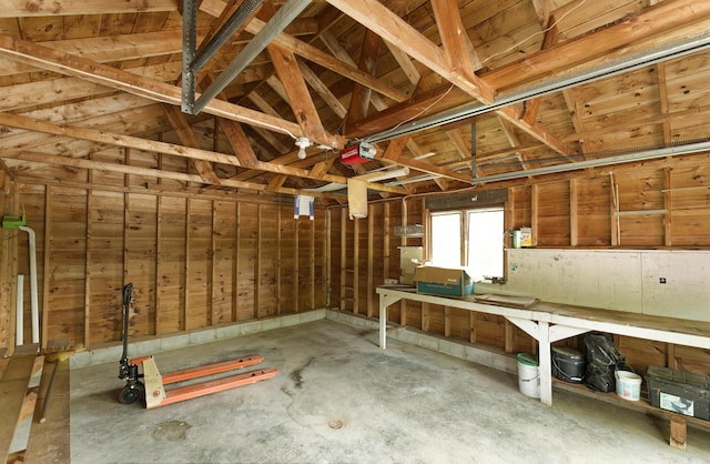 56 Borland Hill Rd, Nobleboro, ME 04555 - garage featuring a garage door opener and a workshop area