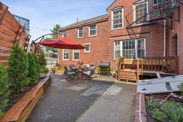 148 State St, Portland, ME 04101 - view of patio with a grill and outdoor dining space