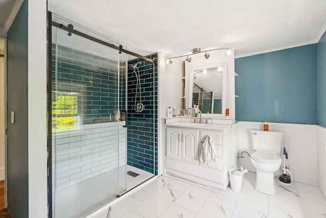 148 State St, Portland, ME 04101 - full bath with toilet, a stall shower, vanity, wainscoting, and ornamental molding