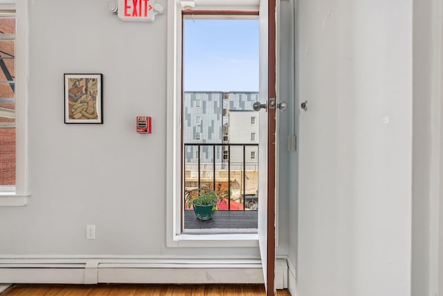 148 State St, Portland, ME 04101 - detailed view of a fire alarm and baseboard heating