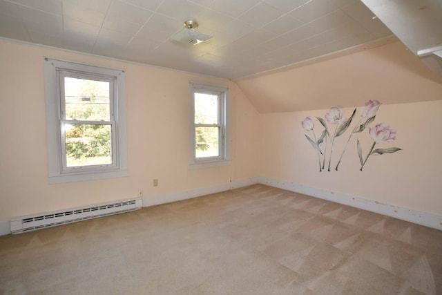 50 Baldwin Rd, Sebago, ME 04029 - bonus room with a baseboard heating unit, light colored carpet, vaulted ceiling, and baseboards