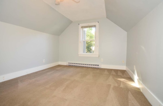 50 Baldwin Rd, Sebago, ME 04029 - bonus room featuring baseboard heating, carpet flooring, vaulted ceiling, baseboards, and ceiling fan