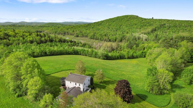 216 Monroe Rd, Winterport, ME 04496 - aerial view of property and surrounding area with a heavily wooded area and a mountainous background
