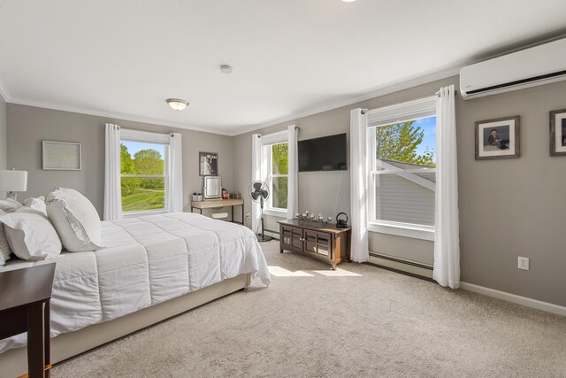 216 Monroe Rd, Winterport, ME 04496 - bedroom featuring a baseboard heating unit, ornamental molding, carpet flooring, an AC wall unit, and baseboards
