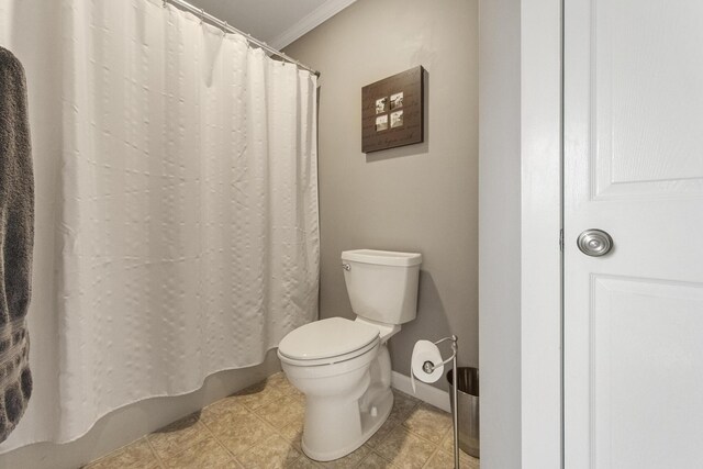 216 Monroe Rd, Winterport, ME 04496 - bathroom featuring toilet, ornamental molding, and a shower with shower curtain