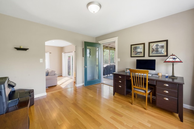 216 Monroe Rd, Winterport, ME 04496 - office space with light wood-type flooring, arched walkways, and baseboards