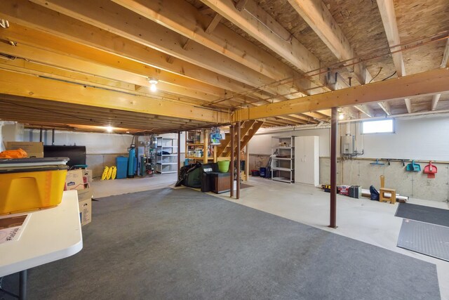 216 Monroe Rd, Winterport, ME 04496 - basement featuring stairs and water heater