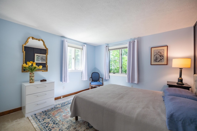 183 Buckfield Rd, Turner, ME 04282 - bedroom with baseboards and light colored carpet