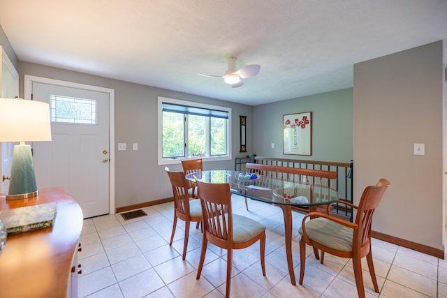 183 Buckfield Rd, Turner, ME 04282 - dining space featuring a ceiling fan, baseboards, and light tile patterned floors