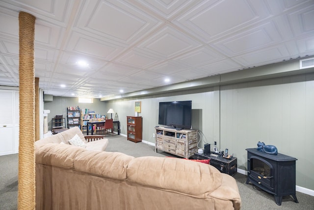 183 Buckfield Rd, Turner, ME 04282 - carpeted living room featuring recessed lighting, baseboards, and a wood stove