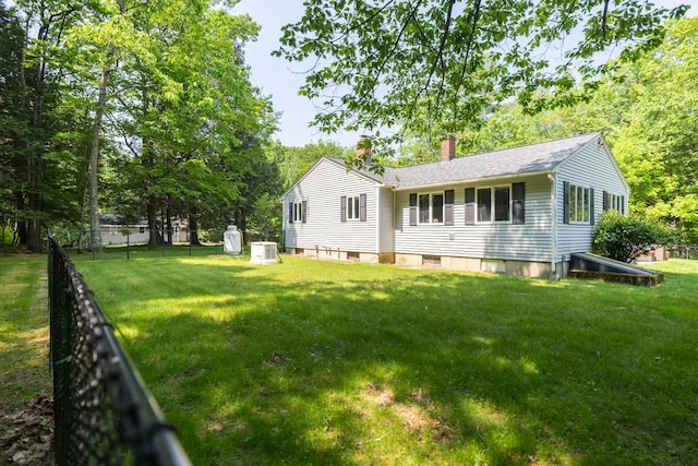 183 Buckfield Rd, Turner, ME 04282 - rear view of house featuring central air condition unit and a chimney