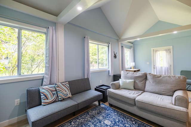 183 Buckfield Rd, Turner, ME 04282 - living area with lofted ceiling, wood finished floors, recessed lighting, and baseboards