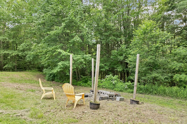 32 Long Hall Dr, Berwick, ME 03901 - view of yard with a fire pit and a view of trees