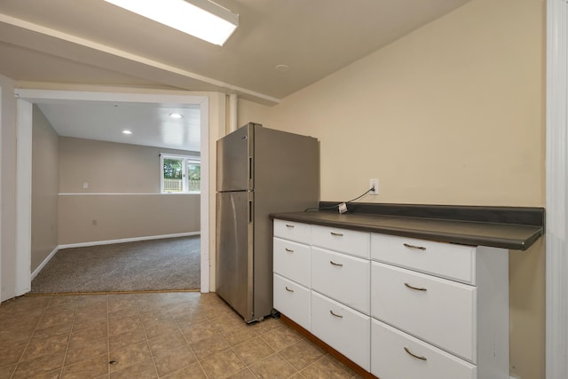 32 Long Hall Dr, Berwick, ME 03901 - kitchen featuring dark countertops, freestanding refrigerator, carpet flooring, white cabinets, and recessed lighting