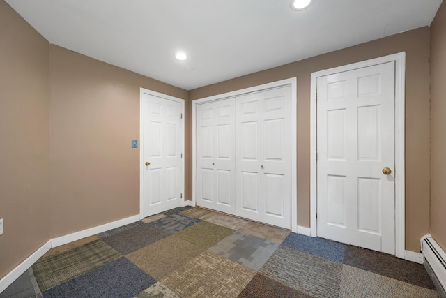 32 Long Hall Dr, Berwick, ME 03901 - unfurnished bedroom featuring a baseboard radiator, recessed lighting, and a closet