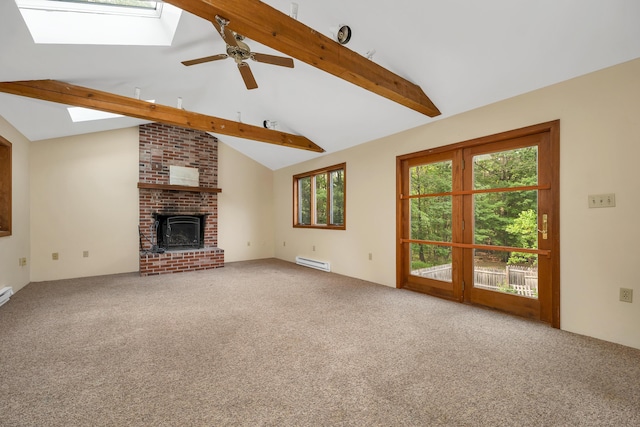 32 Long Hall Dr, Berwick, ME 03901 - unfurnished living room featuring a skylight, a baseboard heating unit, carpet flooring, a brick fireplace, and ceiling fan