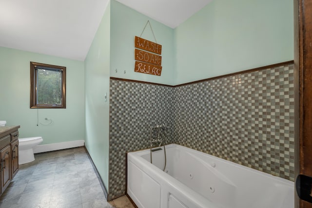 32 Long Hall Dr, Berwick, ME 03901 - bathroom with vanity, a jetted tub, tile walls, and wainscoting
