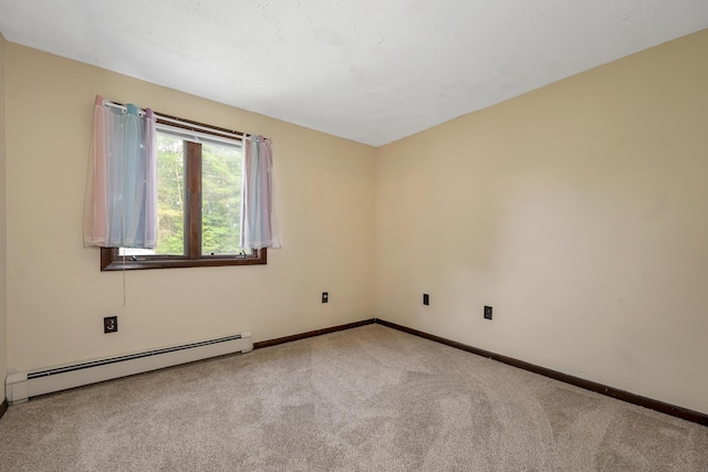 32 Long Hall Dr, Berwick, ME 03901 - carpeted empty room featuring a baseboard radiator and baseboards