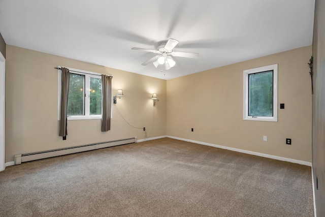32 Long Hall Dr, Berwick, ME 03901 - carpeted empty room featuring a baseboard radiator, plenty of natural light, and ceiling fan