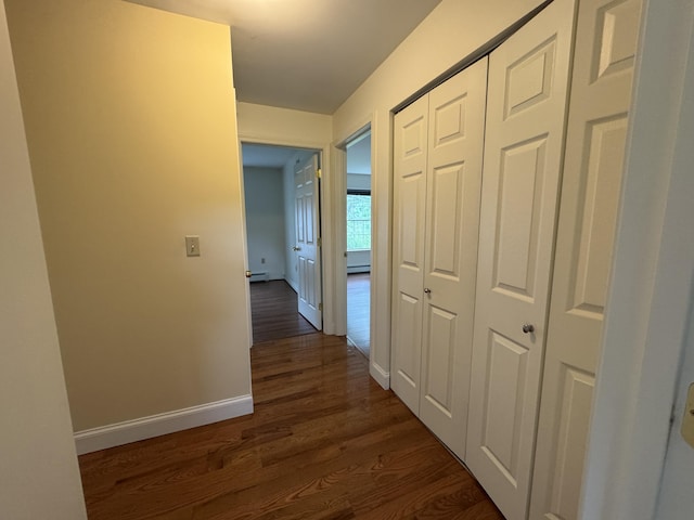 541 Kenduskeag Ave Unit A1, Bangor, ME 04401 - corridor with dark wood-style floors, baseboards, a baseboard radiator, and a baseboard heating unit