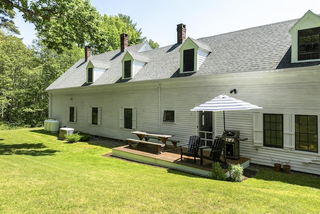 37 Walker Rd, Boothbay, ME 04537 - rear view of house with a deck, a lawn, a chimney, and roof with shingles