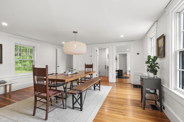 37 Walker Rd, Boothbay, ME 04537 - dining space featuring light wood-style floors, recessed lighting, and a decorative wall