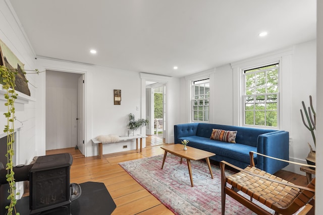 37 Walker Rd, Boothbay, ME 04537 - living area with light wood-style floors, a wood stove, and recessed lighting