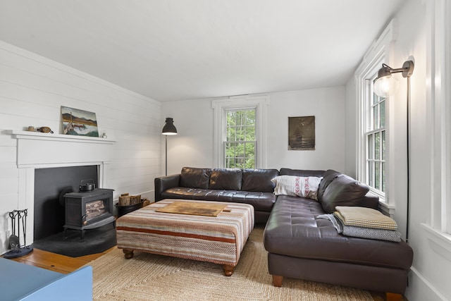 37 Walker Rd, Boothbay, ME 04537 - living area featuring a wood stove, wood finished floors, and wood walls