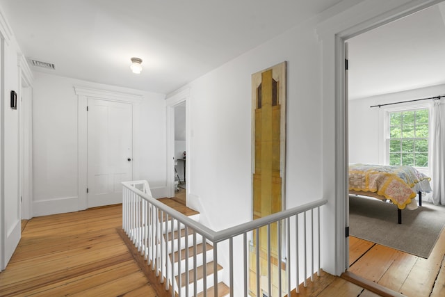 37 Walker Rd, Boothbay, ME 04537 - hall featuring light wood-type flooring and an upstairs landing