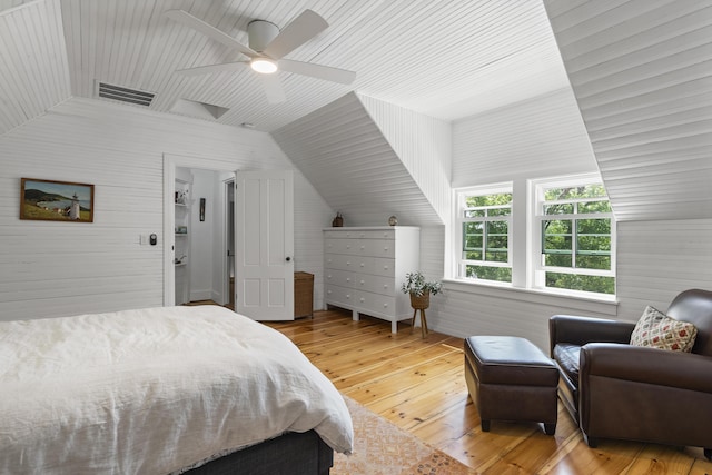 37 Walker Rd, Boothbay, ME 04537 - bedroom with lofted ceiling, wooden walls, hardwood / wood-style flooring, wood ceiling, and ceiling fan