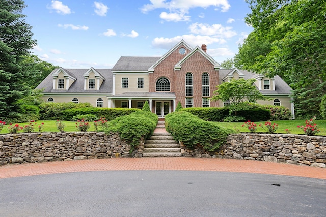 30 Plymouth Dr, Saco, ME 04072 - view of front facade with a chimney and a front lawn