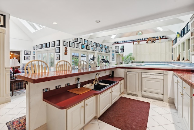 30 Plymouth Dr, Saco, ME 04072 - kitchen featuring a sink, a skylight, dishwasher, and light tile patterned floors