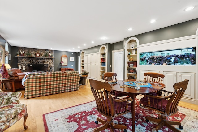 30 Plymouth Dr, Saco, ME 04072 - dining area featuring light wood-type flooring, recessed lighting, and a stone fireplace