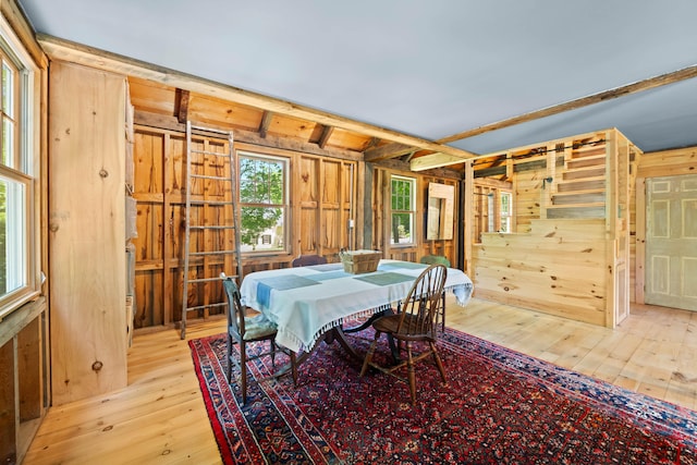 72 Vine St, South Berwick, ME 03908 - dining area with wooden walls, light wood-style floors, and stairway